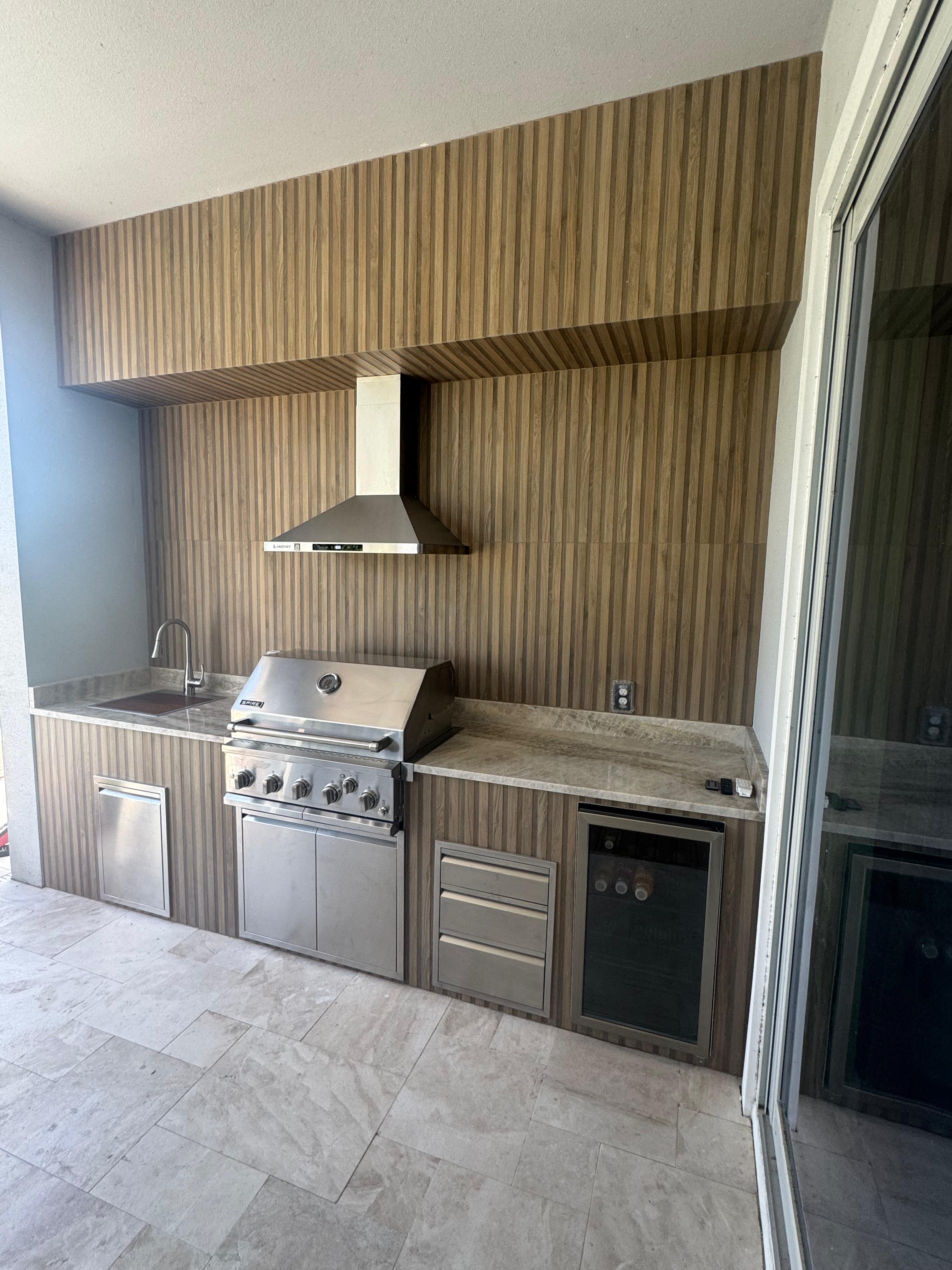 Outdoor kitchen with wood finish